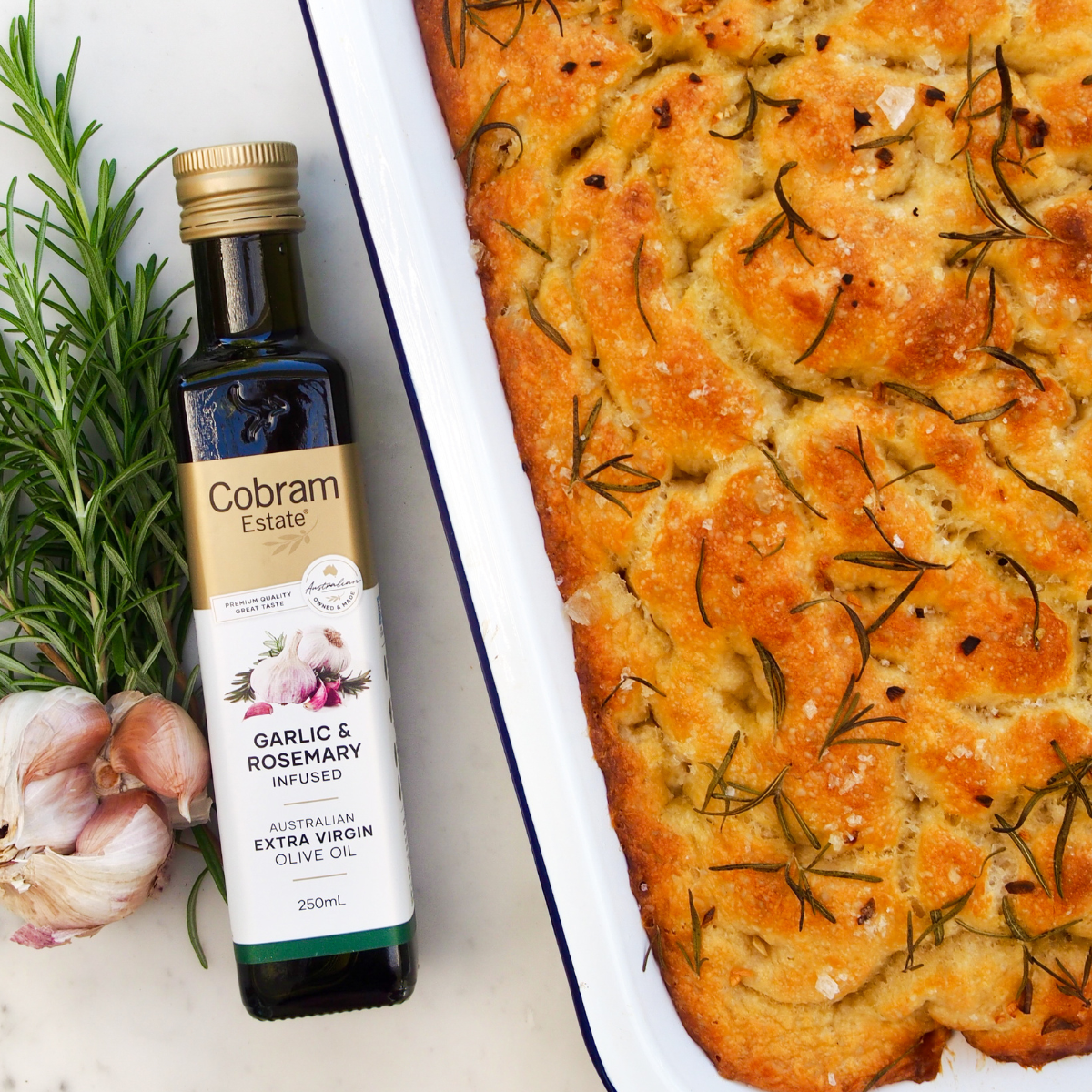 
                  
                    Foccacia Dish made with Garlic & Rosemary Infused | Extra Virgin Olive Oil | Cobram Estate AU
                  
                